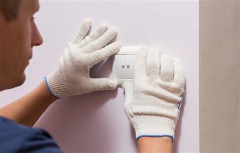 Premium Photo Electrician Installing Light Switch Close Up Photo