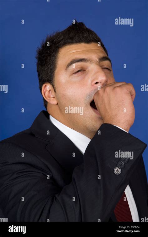Business Man Yawning Stock Photo Alamy