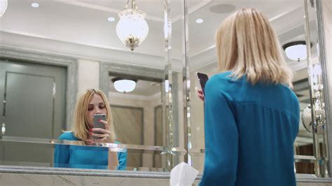 Woman Taking Selfie In Bathroom Mirror Stock Footage Sbv