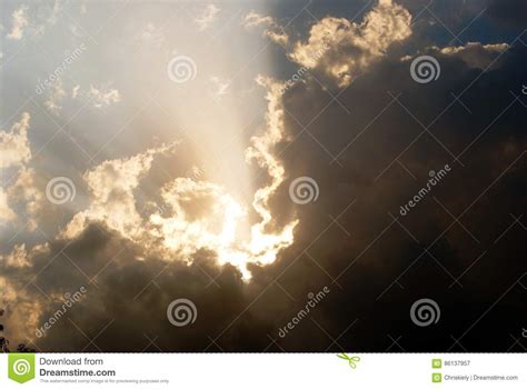 Sun Behind the Cloud stock image. Image of smiling, behind ...