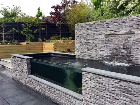 Modern Sloping Garden With Feature Koi Pond Lush Garden Design Koi