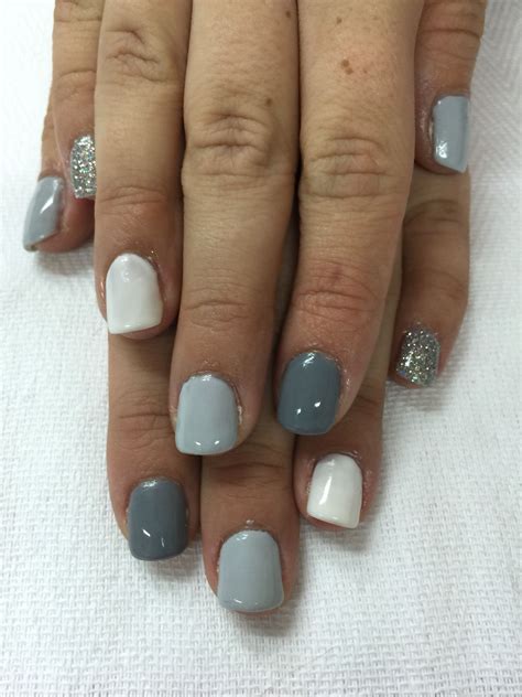 Here are some gorgeous gray nail art design ideas between black and gray nails, pink and grey nails, and gray ombre nails! Shades of grey gel nails. Two greys, white and silver ...