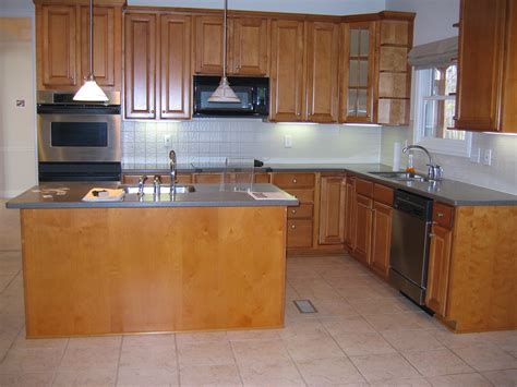 Check spelling or type a new query. L shaped kitchen layouts with island - increasingly ...