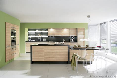 You can see here that it blends in quite nicely with a traditionally styled kitchen and more modern center island. Pictures of Kitchens - Modern - Two-Tone Kitchen Cabinets ...