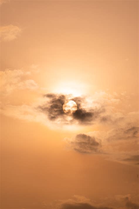 Download Wallpaper 4000x6000 Sun Clouds Sky Sunset Hd Background