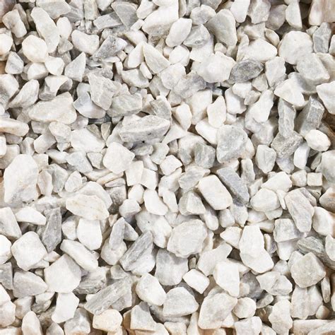 A stone that in appearance is shades of brown, orange, and grey. Vigoro 0.5 cu. ft. Marble Chips-54141 - The Home Depot