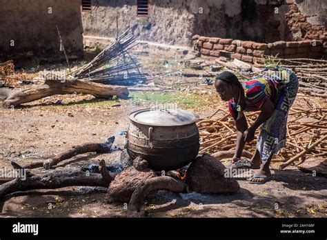 Benin Kandi African Woman Cooking Open Fire Courtyard African