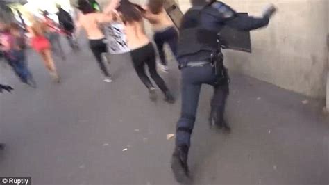 French Policeman Face Plants Into Wall As He Gets Distracted While