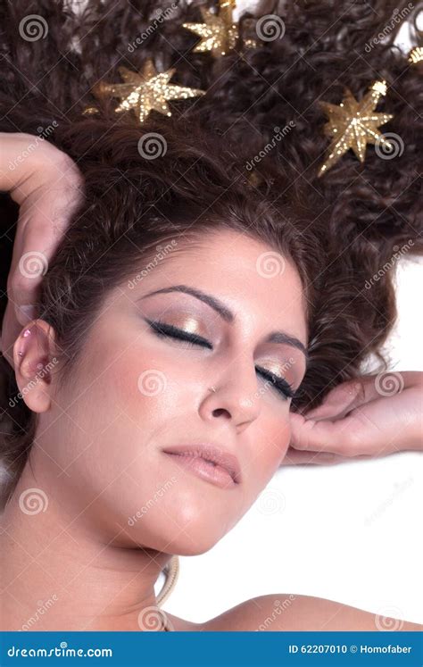 Attractive Female Woman S Face With Gold Stars On Her Hair Stock Photo