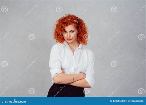 Grumpy Girl Closeup Portrait Young Serious Angry Redhead Curly Ginger Hair Woman Isolated On