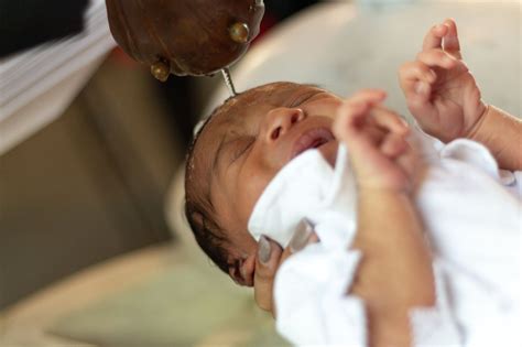 Black Catholic Infant Baptism Catholic Stock Photo