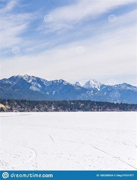 Frozen Windermere Lake And Rocky Mountains In British Columbia Canada