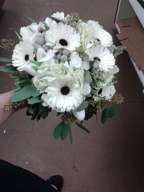 White blue and gray wedding bouquets. White and grey wedding bouquet with tulips, berries and ...