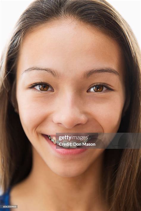 Mixed Race Girl Smiling With Braces High Res Stock Photo Getty Images