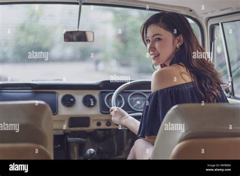 young woman in the vintage car Stock Photo - Alamy