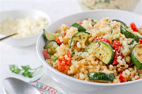 Let stand 10 minutes and strain excess water, if necessary. PARMESAN COUSCOUS WITH ZUCCHINI AND SUNDRIED TOMATOES by ...