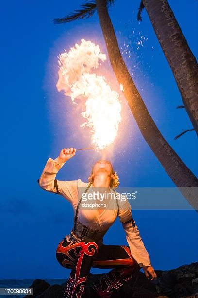 woman spitting fire photos and premium high res pictures getty images