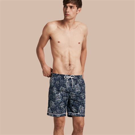 Shop from a variety of swim shorts, sunglasses and other men's swimwear. Burberry Peony Rose Print Swim Shorts in Blue for Men | Lyst