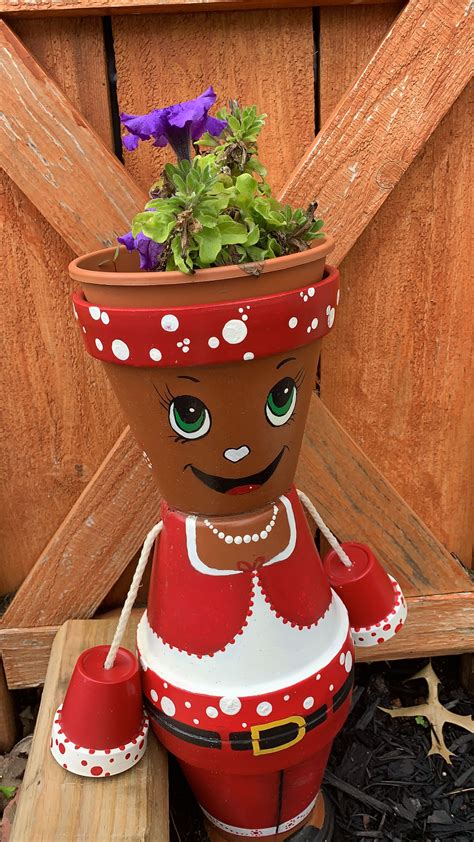 Pin By Velma Ashley On Backyard Pot People Clay Pot Crafts Flower Pot Crafts Christmas Clay