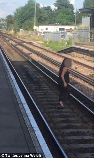 Video Shows Drunken Woman Stumbling On Railtracks At Woking Station Daily Mail Online