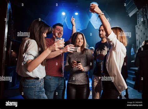 Party Atmosphere Happy People Dancing In The Luxury Night Club Together With Different Drinks