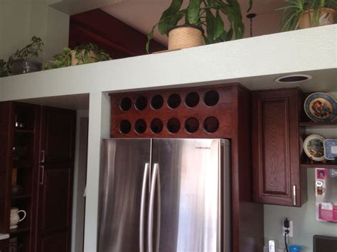 For the wine fridge and kegorator to diy with a desk. Handmade Open Wine Cabinet Above Refrigerator by Beack ...