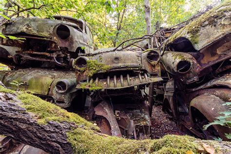 Stacks Of Abandoned Cars Covered In Moss 2048×1365 Photographed By