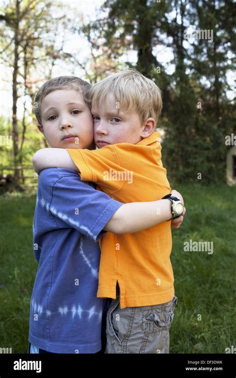 Two Boys Hugging Stock Photo Alamy