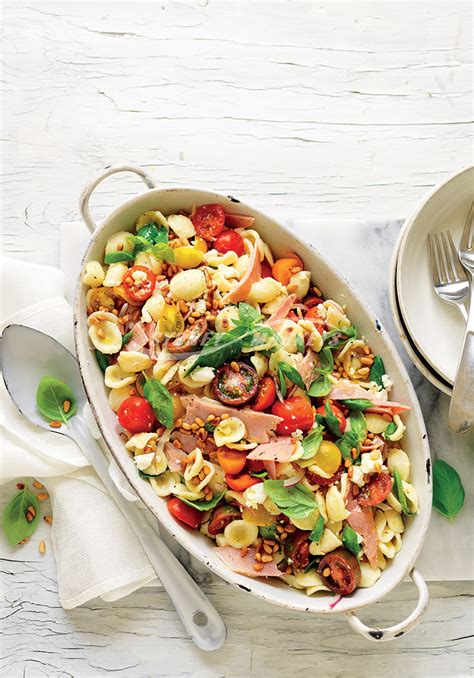 Serve the dish with a simple green salad or sliced fresh tomatoes and biscuits or rolls. Sydney Markets - Summer tomato, ham & basil pasta salad