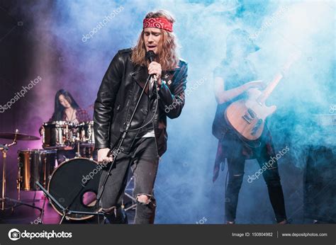 Rock Band On Stage — Stock Photo © Tarasmalyarevich 150804982