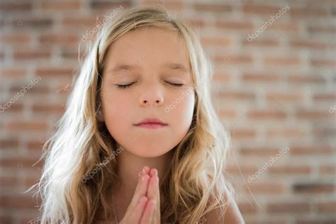 Little Girl Closed Her Eyes And Prays — Stock Photo © Bestphotostudio