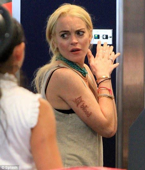 Lindsay Lohan Left Overexposed In Miami Surf When Bikini Top Fell Off Daily Mail Online