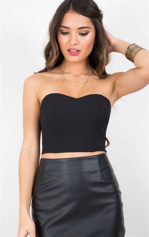 You can layer the top over a fitted, long sleeve or under an oversized jacket for a different look. Black Strapless Bustier Crop Top by Showpo | UsTrendy