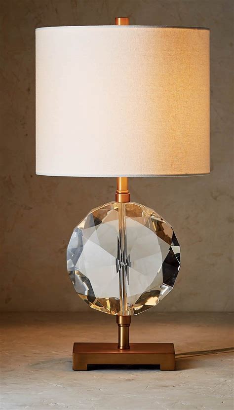 The large stacked crystals in this lamp bring dramatic style to a table. Inspired by an intricately faceted diamond, our Bijoux ...
