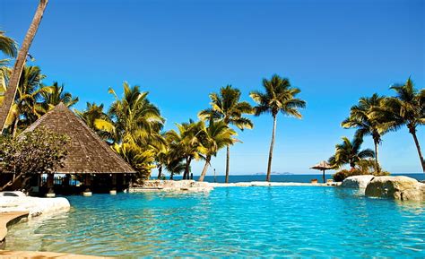 Fiji Resort Body Of Water And Palm Trees Travel Islands Tropical