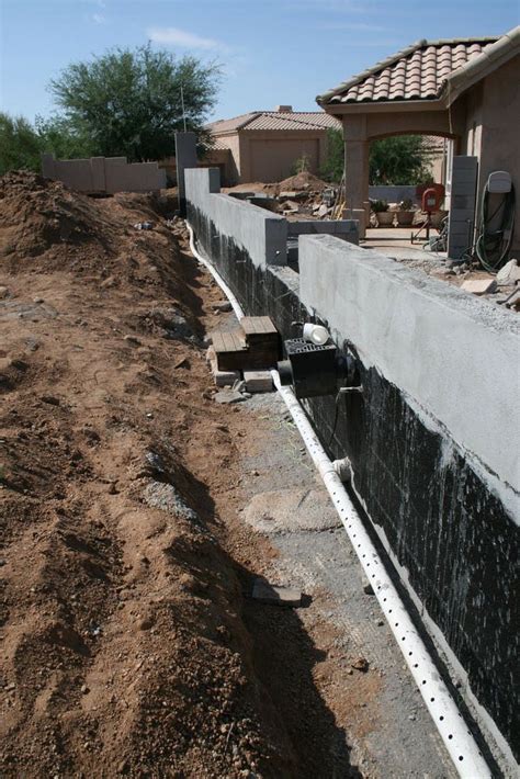 Leave approximately 5 between top of gravel and ground surface. Tips to Build a French Drain With Gravel and Stone ...