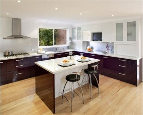 It includes a sink with a faucet, stovetop, an oven, some storage and a lot of counter space. Island Kitchen Designer in Pune - Island Kitchen Design ...