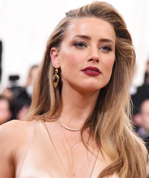 Amber Heard Takes Some Weight Off Her Shoulders With This Haircut In
