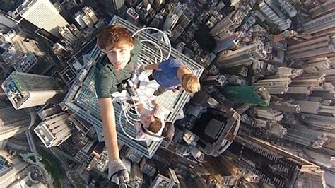 Daredevil Selfies Photographers Scale Hong Kongs Skyscrapers