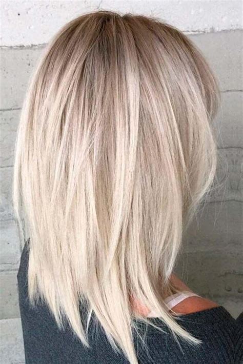 Keep in mind, feathered hairstyles can have layers within them. 15 Inspirations of Medium Long Layered Bob Hairstyles