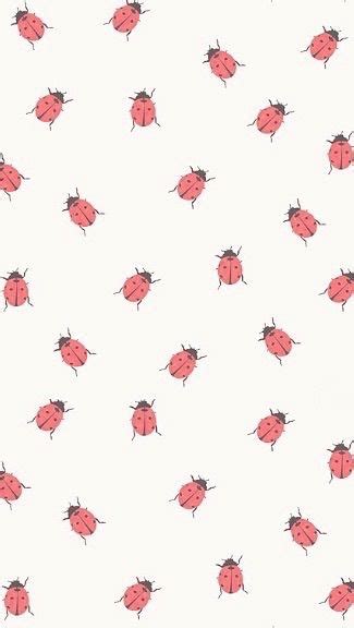 Red Ladybugs On A White Background With Black Dots In The Middle All