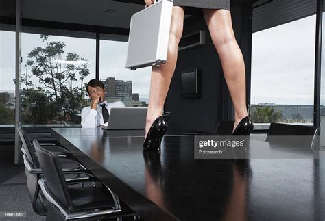 Businessman Looking At Womans Legs Photo Getty Images