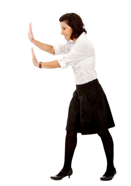 Business Woman Pushing Something Imaginary Isolated Over A White
