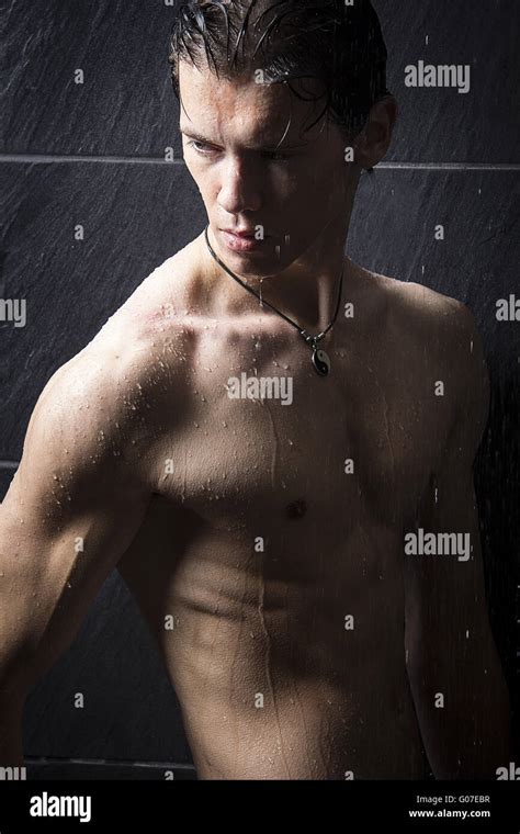 A Man Under Shower Stock Photo Alamy