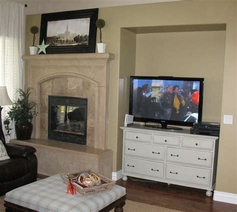 Above the fireplace seems like a fine place to put a tv, but it's a bad idea. common ground : Design Challenge #5 Jen's Fireplace and Niche