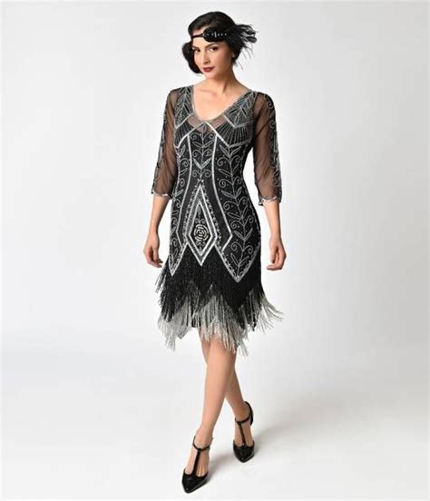 1920s style black and silver beaded sleeved scarlet fringe flapper dress 1920s fashion flapper