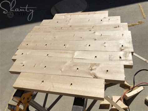 While the glue was drying, i started working on the table top. DIY Round Coffee Table - Shanty 2 Chic