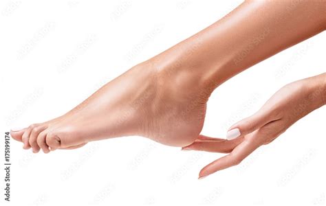 Perfect Female Feet Hand Touches Elegant Leg Stock Photo Adobe Stock
