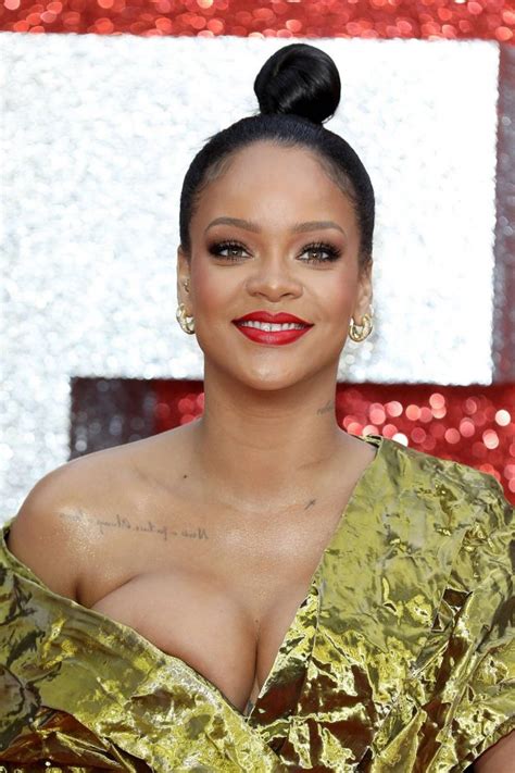 Rihanna Narrowly Avoids Nip Slip As She Flashes ENTIRE Boob In Red