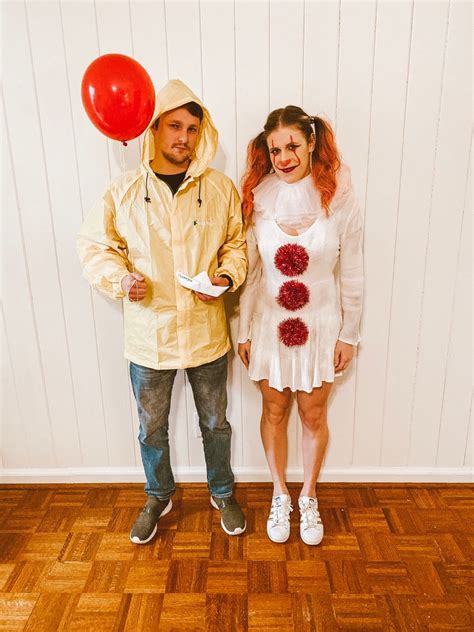 A Spooky Couple Costume Georgie And Pennywise From Stephen Kings It